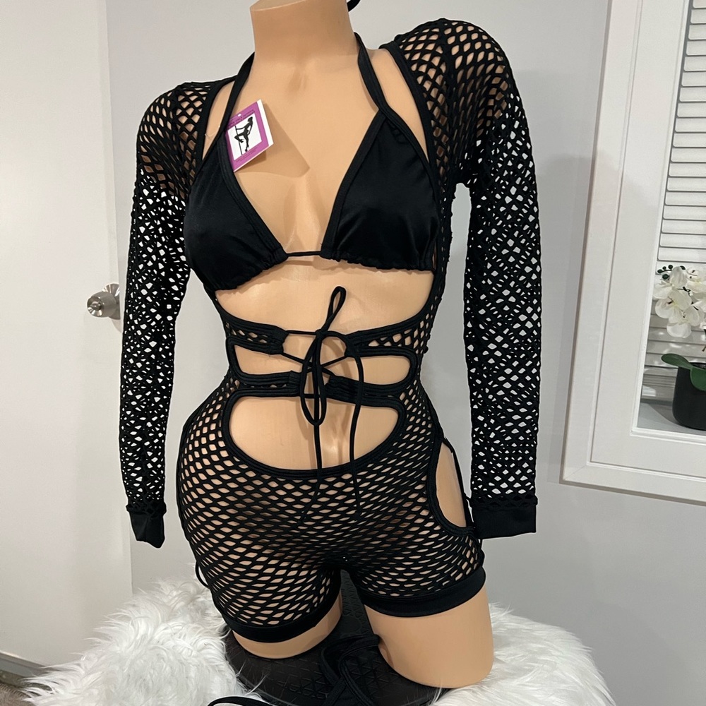 Exotic dancer wear black fishnets